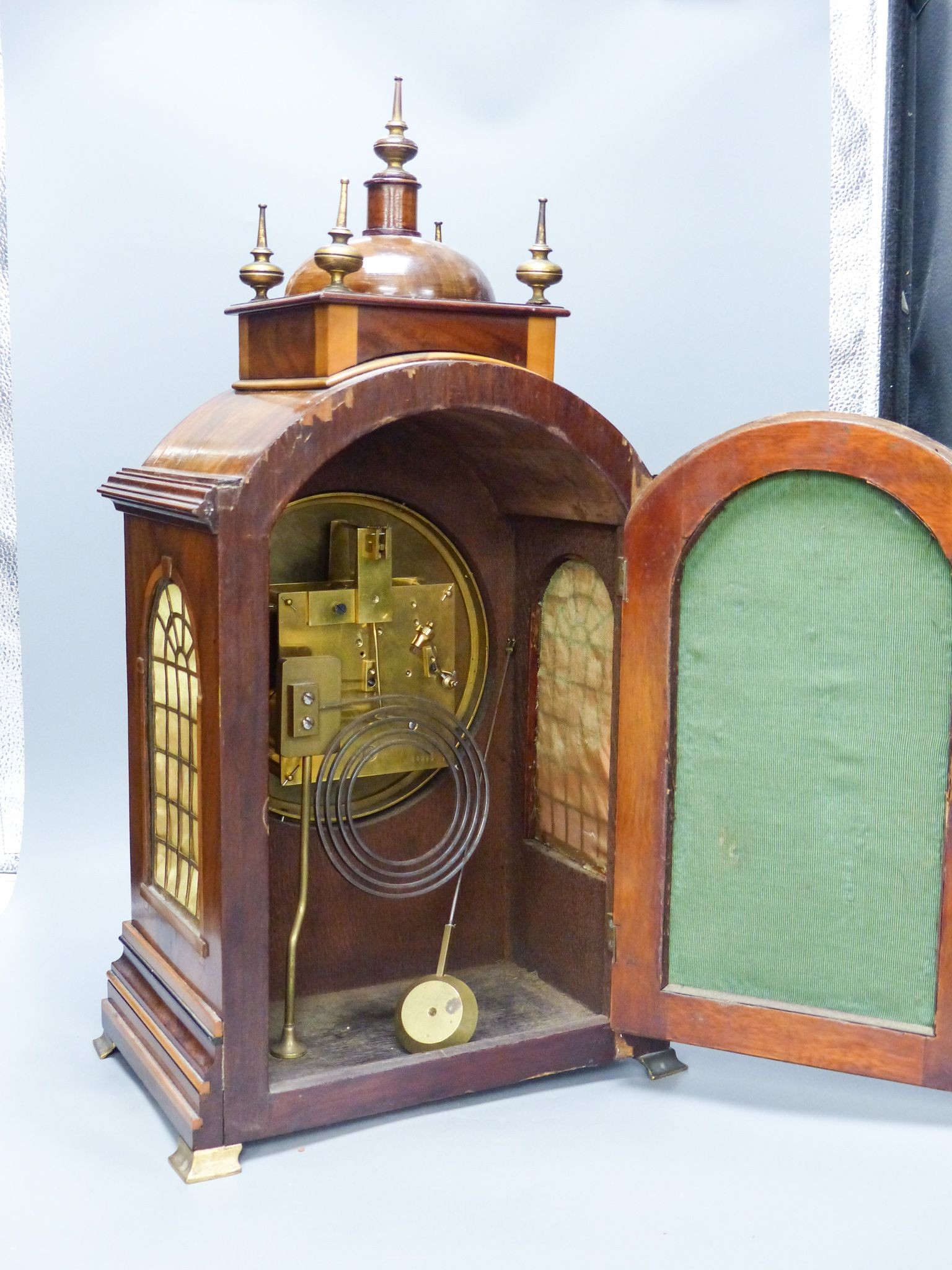 A French flame mahogany and satinwood banded bracket clock retailed by J.W Benson 56cm